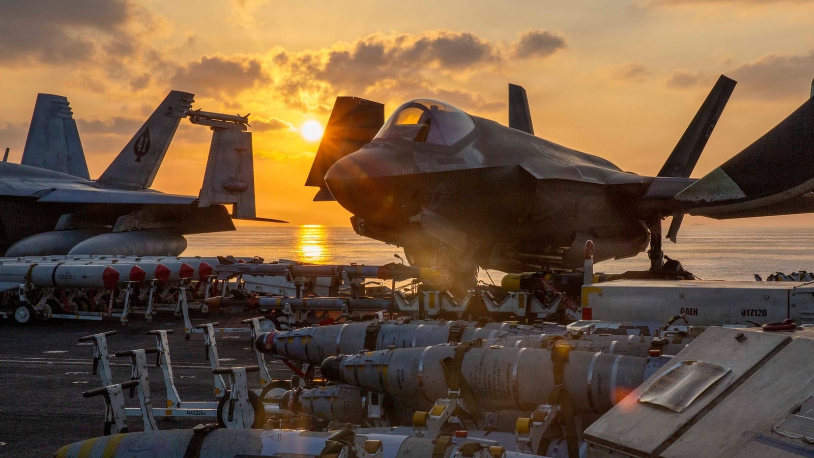 Oil spikes and stocks slide after new US strikes on Iran, but Nasdaq futures are already clawing back
